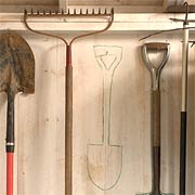 Outline your tools on the wall to show where they belong.