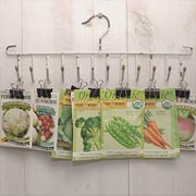 Half used seed packets can be clipped and hung from a belt hanger.