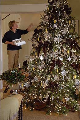 Brown is one of my favorite colors to start the palette when decorating my tree. It is a natural color that blends well with the colors of my cottage. This year I chose white, silver and gold to highlight my tree. 