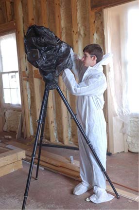 20120213Brent10 Brent and the camera all suited up to get cover of soy foam insulation going in.