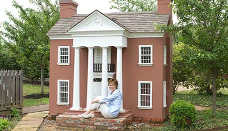 20120430_G2B05 Our Little Acre write Kylee hanging out in front of the Arkansas Governor's Mansion playhouse.
