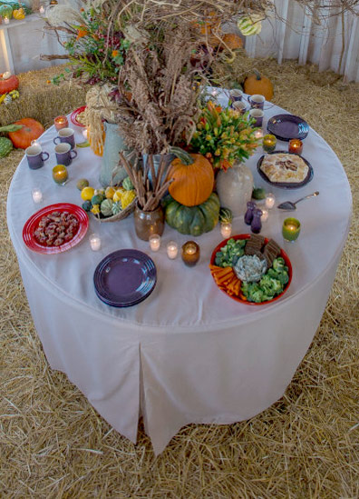 A round table makes it easy for guests to go around and choose what they like to eat and visit with one another.